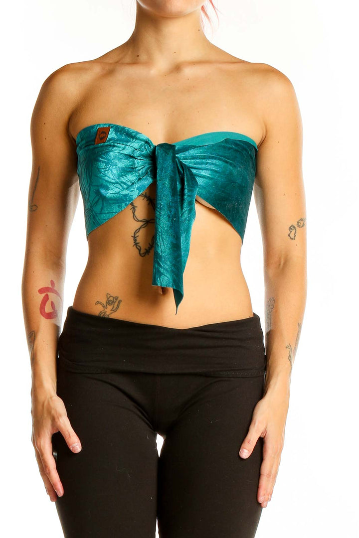 Front view of teal strapless tie-front crop top by SilkRoll