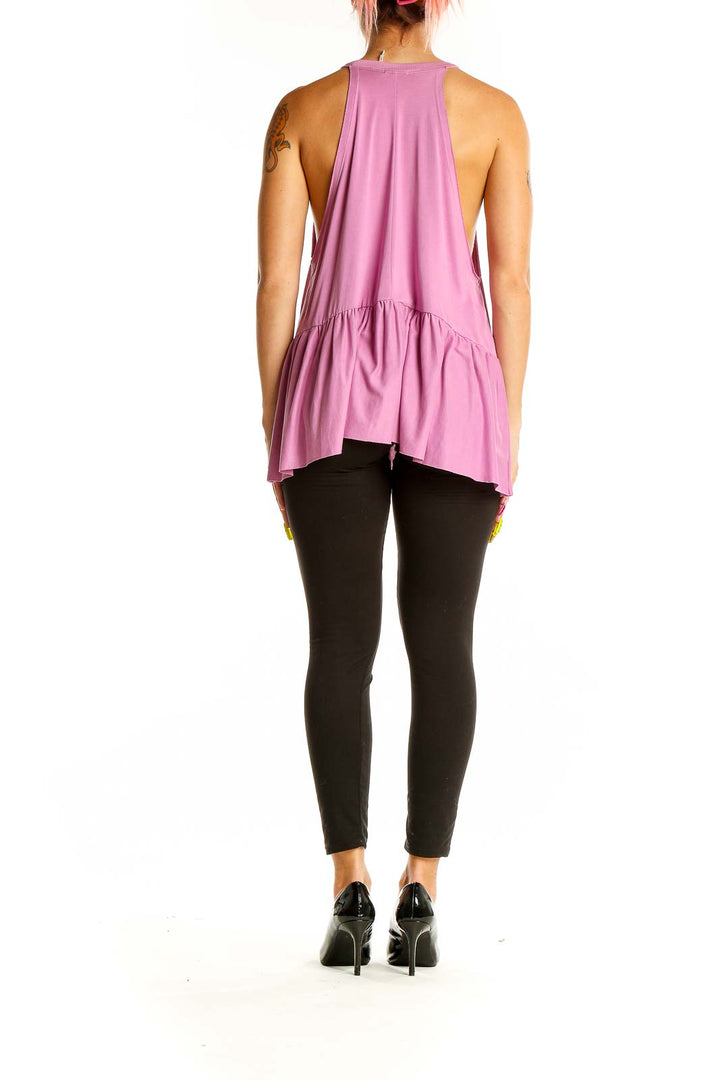 Back view of pink Kimchi Blue peplum tank top showing flowy hem