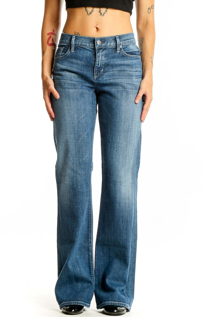 Front view of Citizens of Humanity blue wide-leg jeans on model