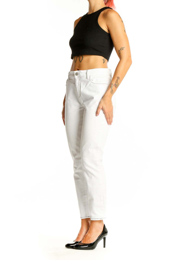 Front view of LOFT white straight leg jeans on model