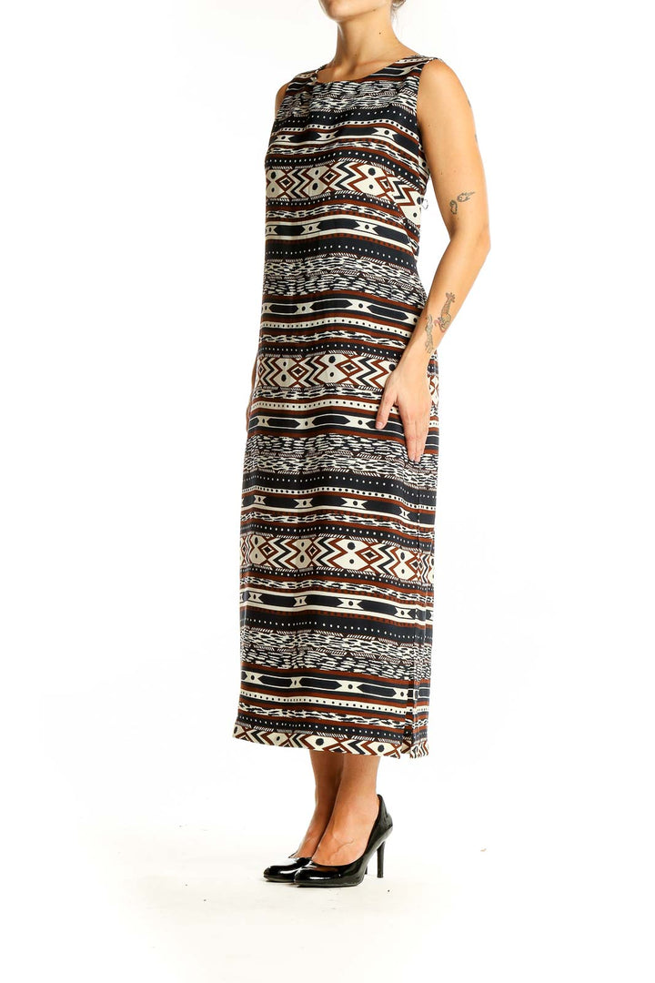 Front view of Danny & Nicole Brown Tribal Print Maxi Dress with geometric pattern