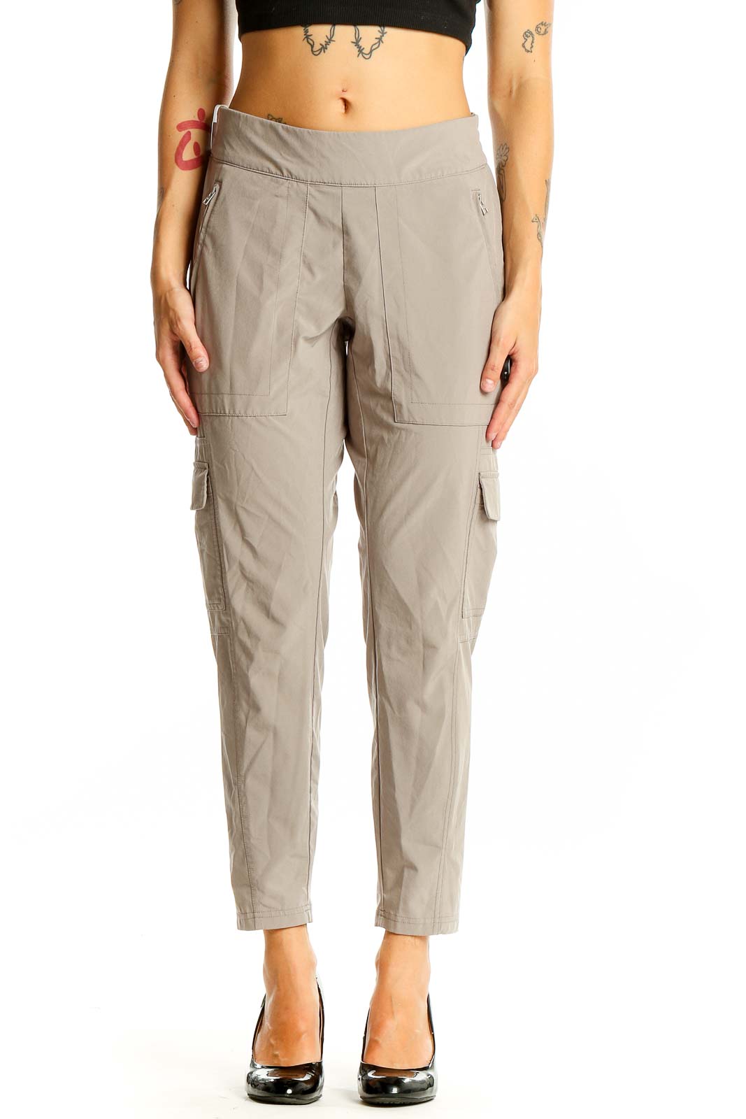 Front view of Athleta beige cargo-style athletic pants