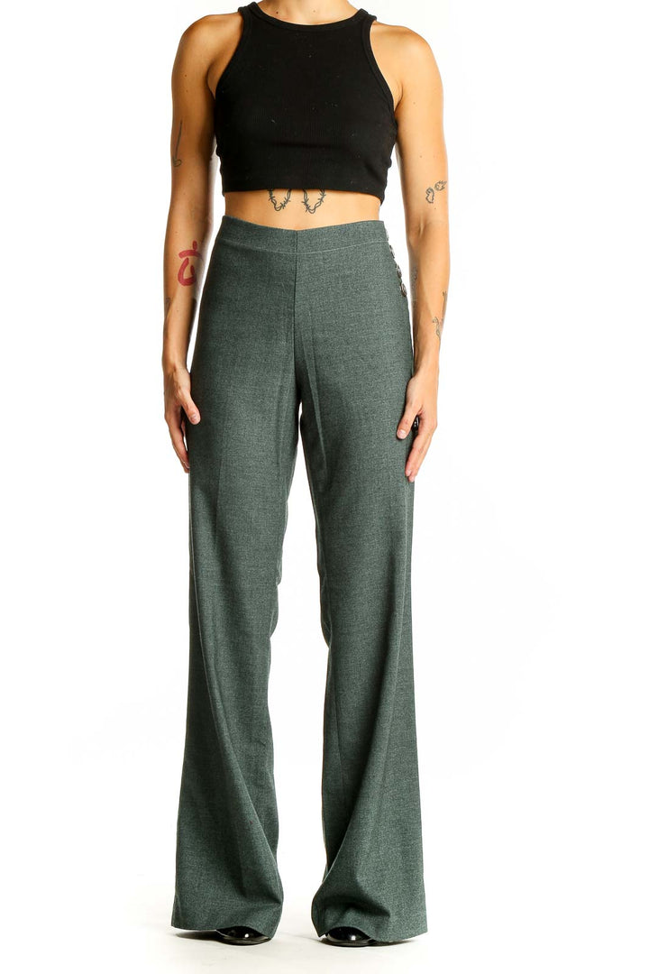 Front view of Elevenses green wide-leg dress pants on model