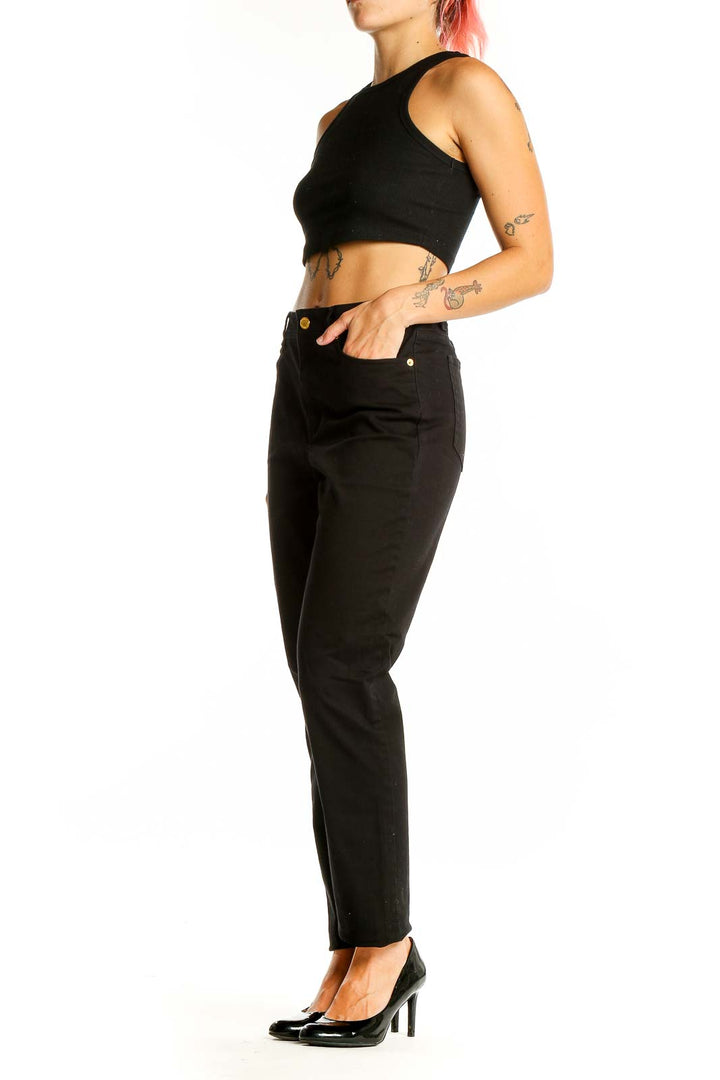 Front view of Michael Kors black high-waisted straight-leg jeans