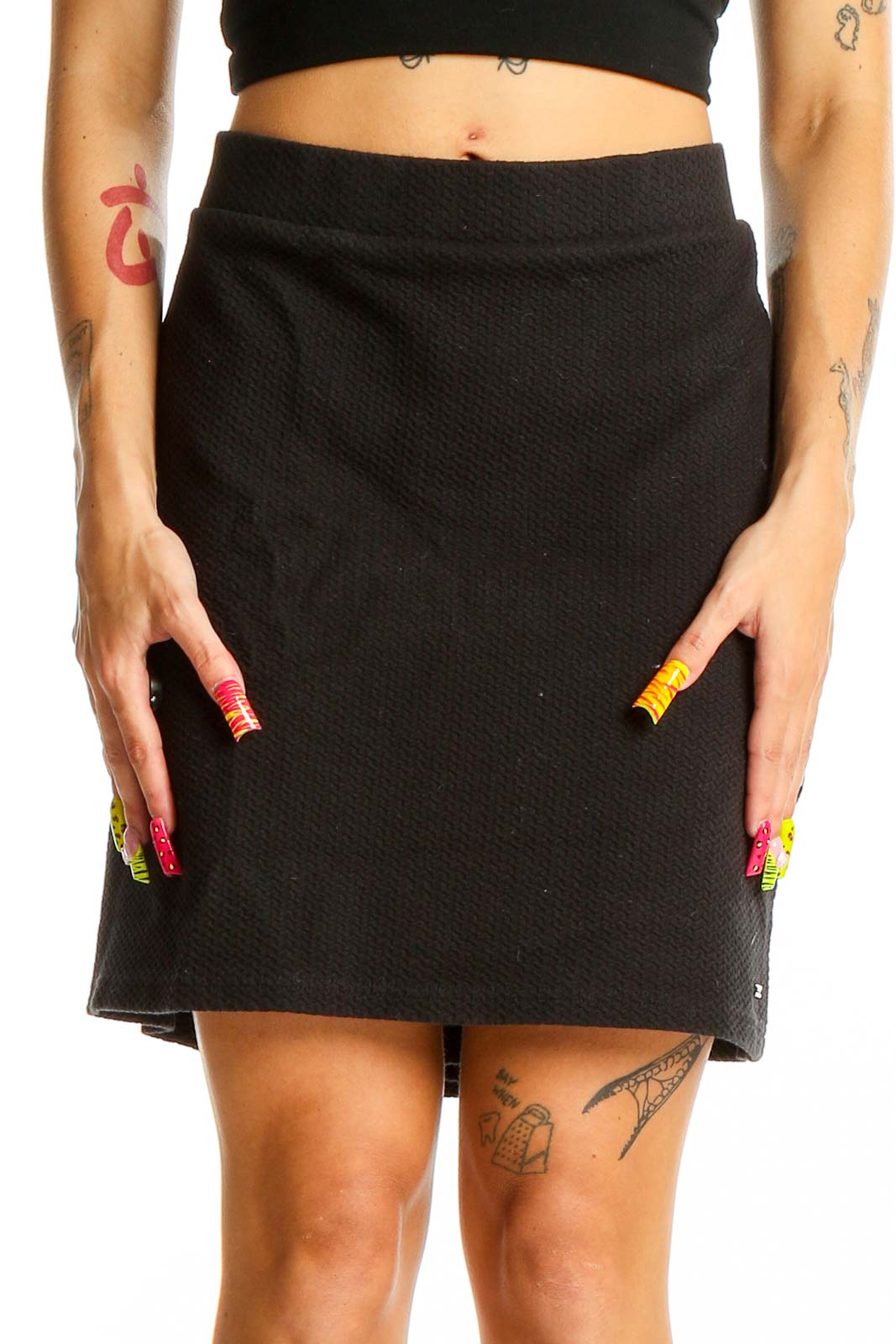 Front view of Joules black textured A-line mini skirt