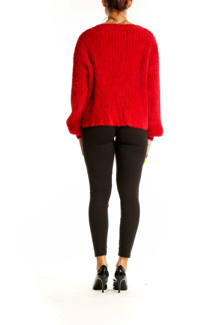 Back view of red fuzzy MINKPINK cardigan showing relaxed fit and texture