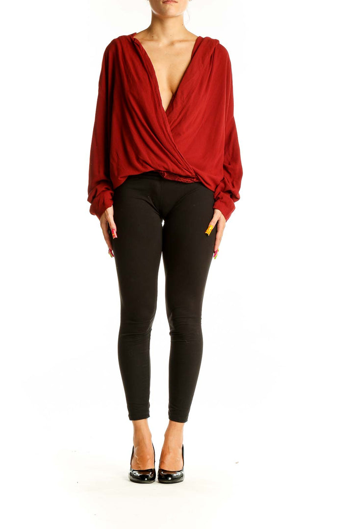 Front view of red rayon wrap top with plunging neckline