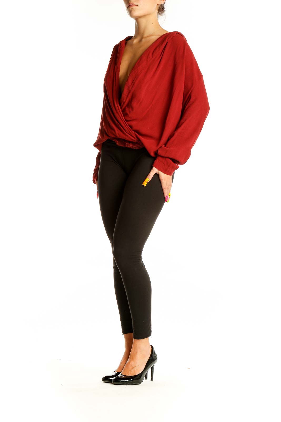 Front view of red rayon wrap top with plunging neckline