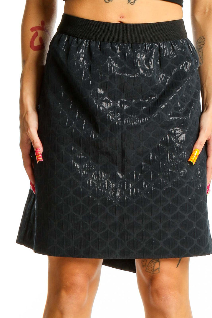 Front view of Ann Taylor LOFT black metallic textured A-line skirt