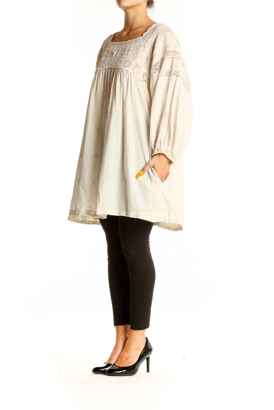 Front view of cream lace cotton dress from Free People with square neckline and long sleeves