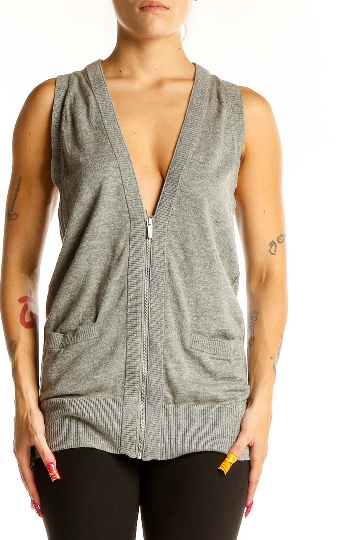 Front view of Banana Republic gray zip-up vest with V-neck and pockets