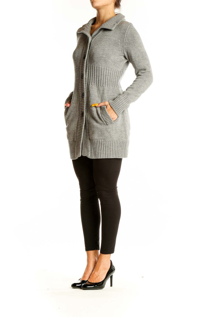 Front view of gray Banana Republic merino wool cardigan with button-front closure