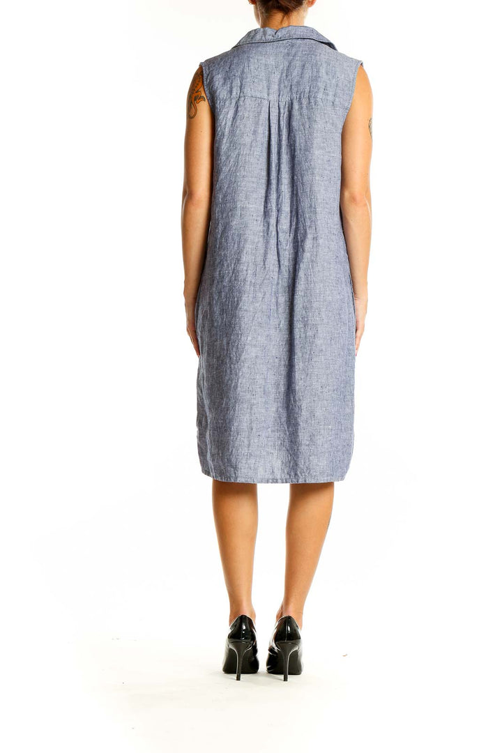 Back view of Tahari blue linen sleeveless shirt dress showing relaxed fit