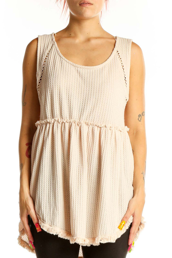 Front view of Umgee beige textured babydoll tank top with empire waist