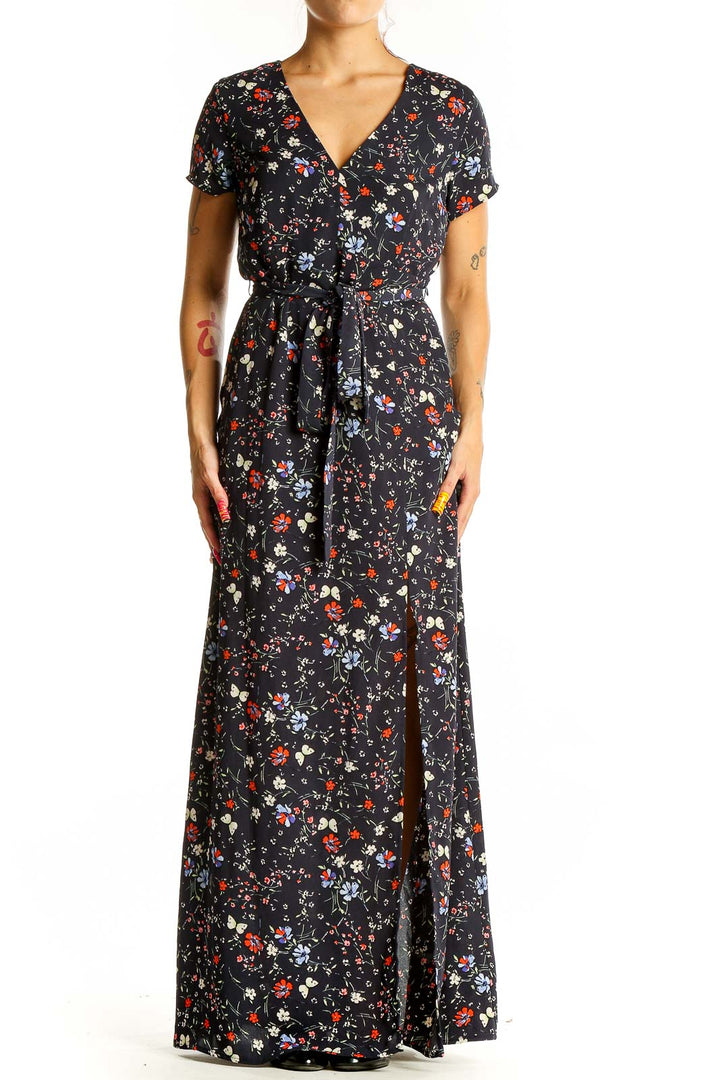 Front view of Sanctuary black floral print maxi dress with V-neck and wrap-style design