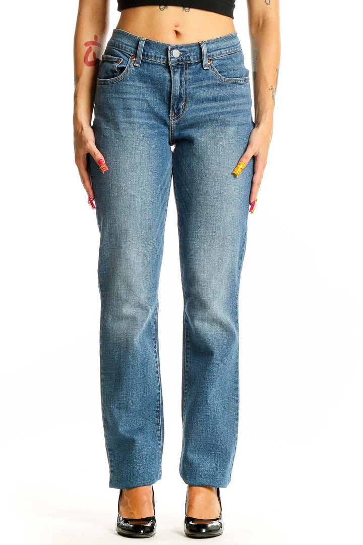 Front view of Levi's medium wash straight leg jeans on model