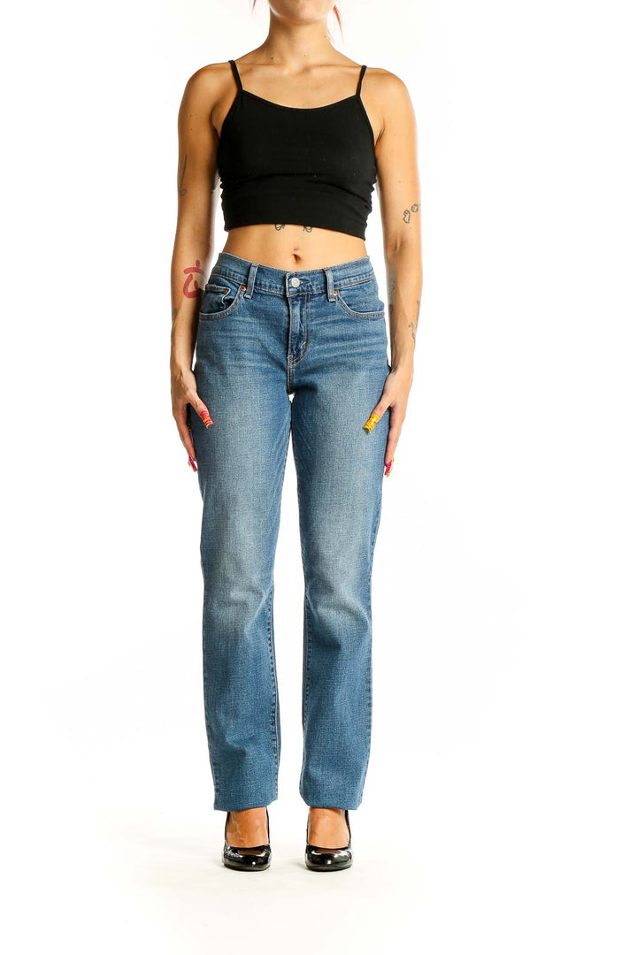 Front view of Levi's medium wash straight leg jeans on model