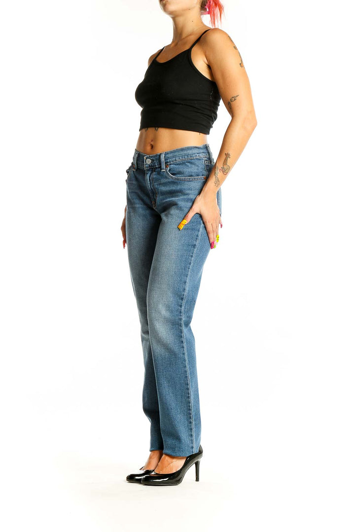 Front view of Levi's medium wash straight leg jeans on model