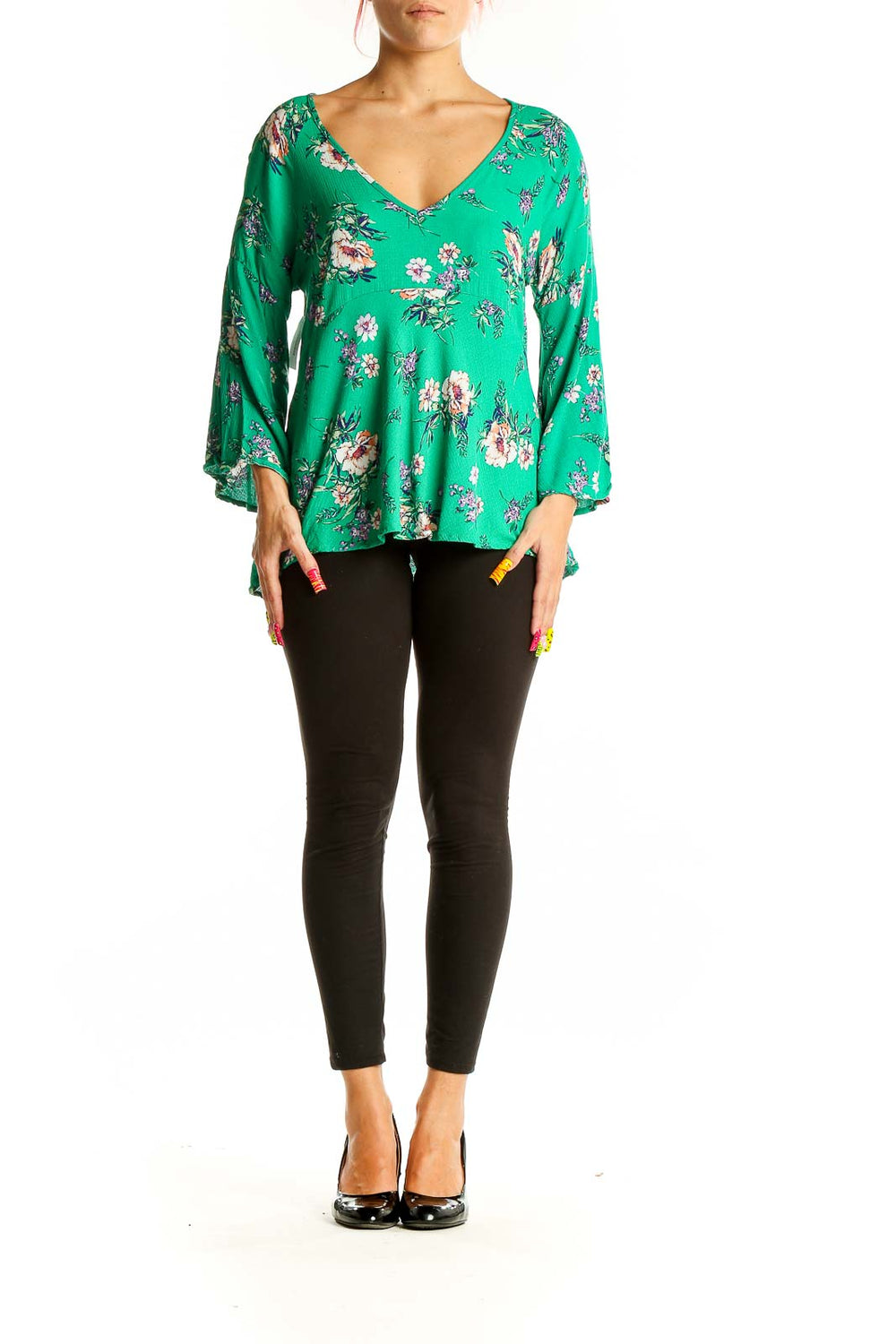 Front view of Rachel Zoe green floral blouse with bell sleeves