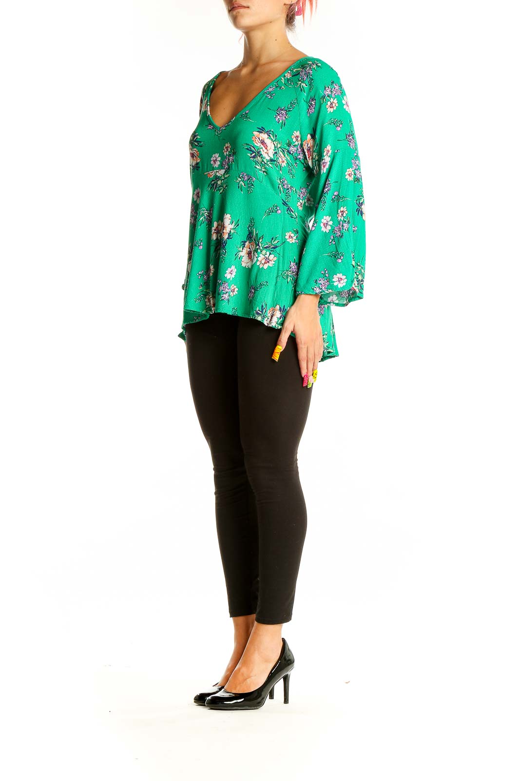 Front view of Rachel Zoe green floral blouse with bell sleeves