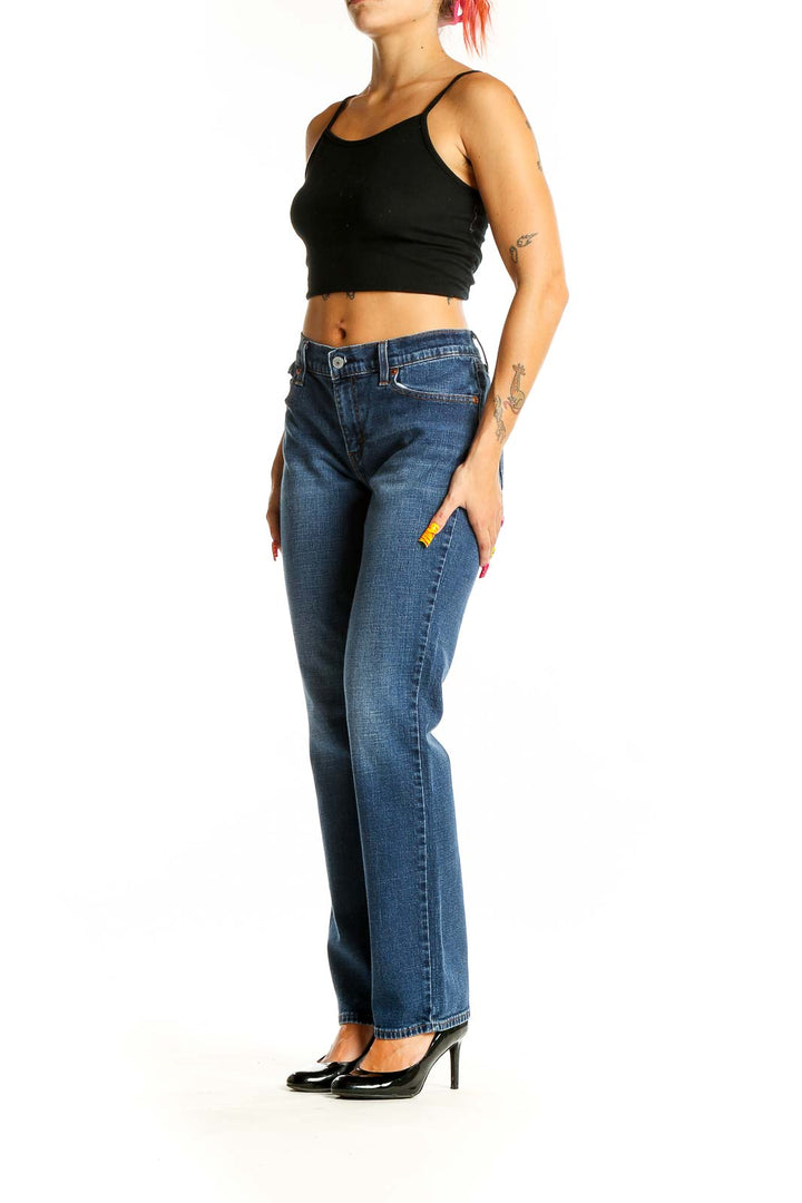 Front view of Levi's medium blue straight leg jeans on model