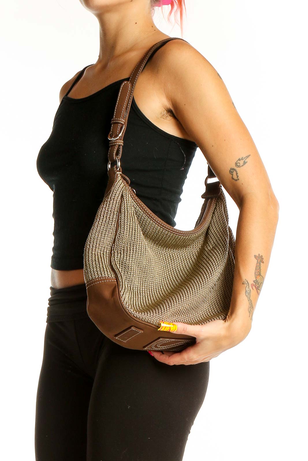 Front view of The SAK tan woven hobo shoulder bag