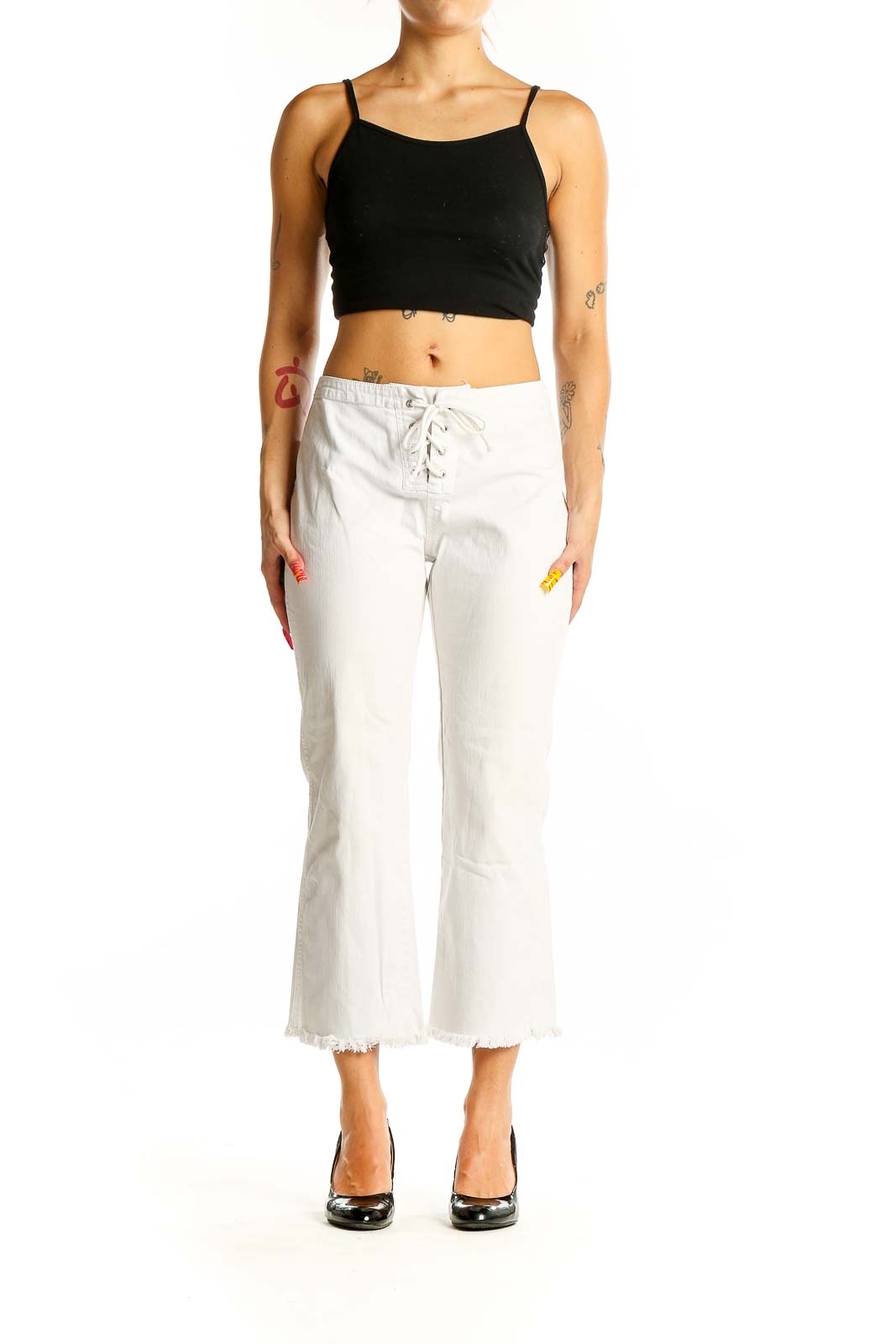 Front view of white lace-up cropped denim jeans from Express