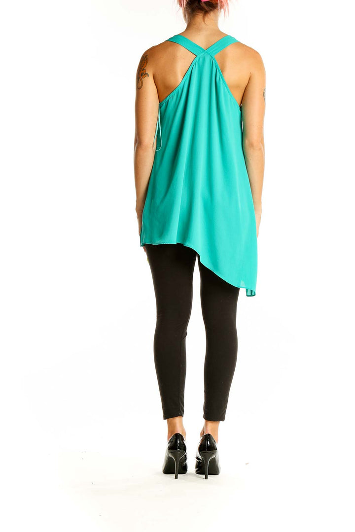 Back view of teal asymmetrical tank top with unique racerback design