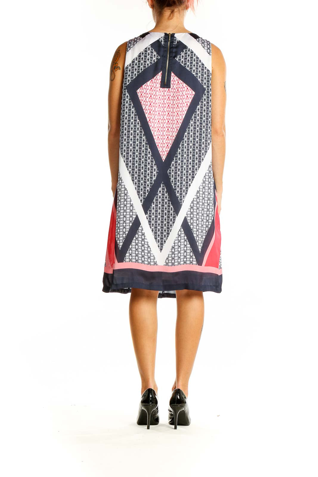 Back view of Dana Buchman sleeveless dress showing geometric pattern and zipper closure