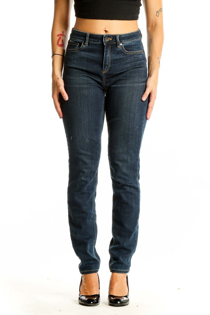 Front view of Elie Tahari dark blue slim fit jeans on model