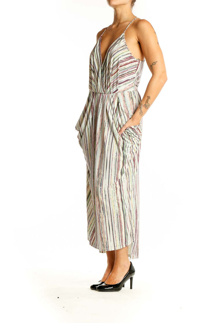 Front view of BCBGeneration multicolor striped midi dress with V-neck and spaghetti straps