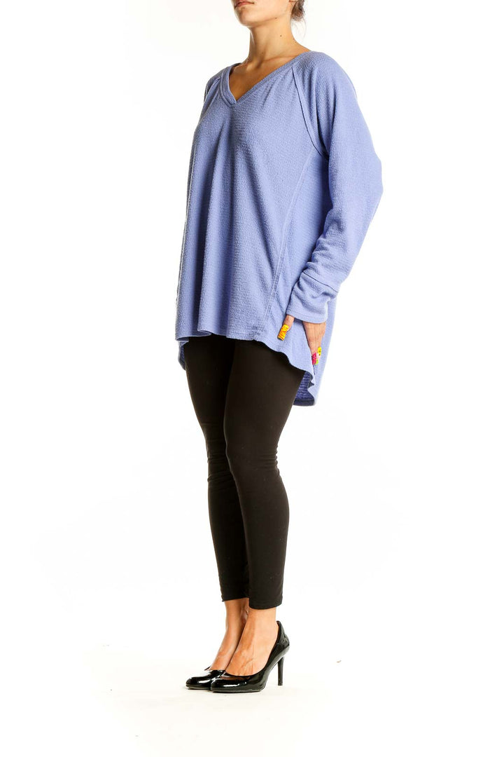 Front view of periwinkle WILDFOX V-neck oversized knit sweater