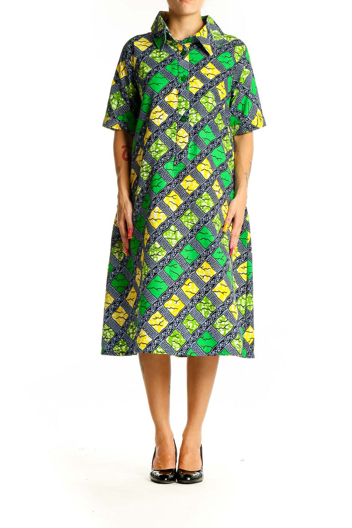 Front view of SilkRoll geometric print shirt dress in green, yellow, and navy