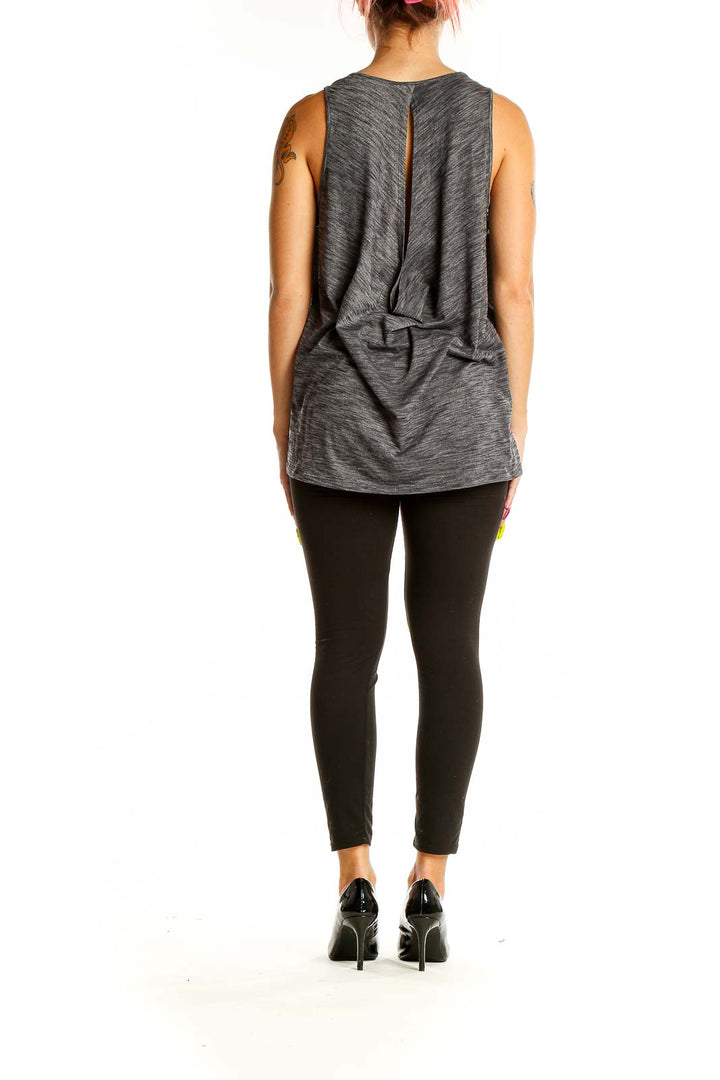 Back view of gray Lululemon athletic tank top showing racerback design with draped detail