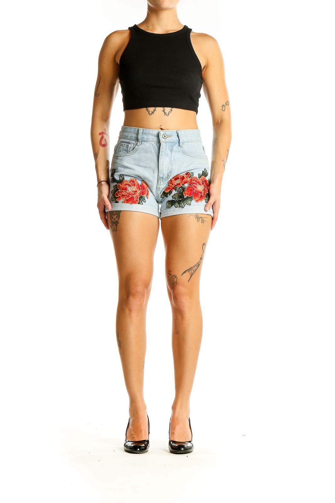 Front view of light blue denim shorts with red floral embroidery