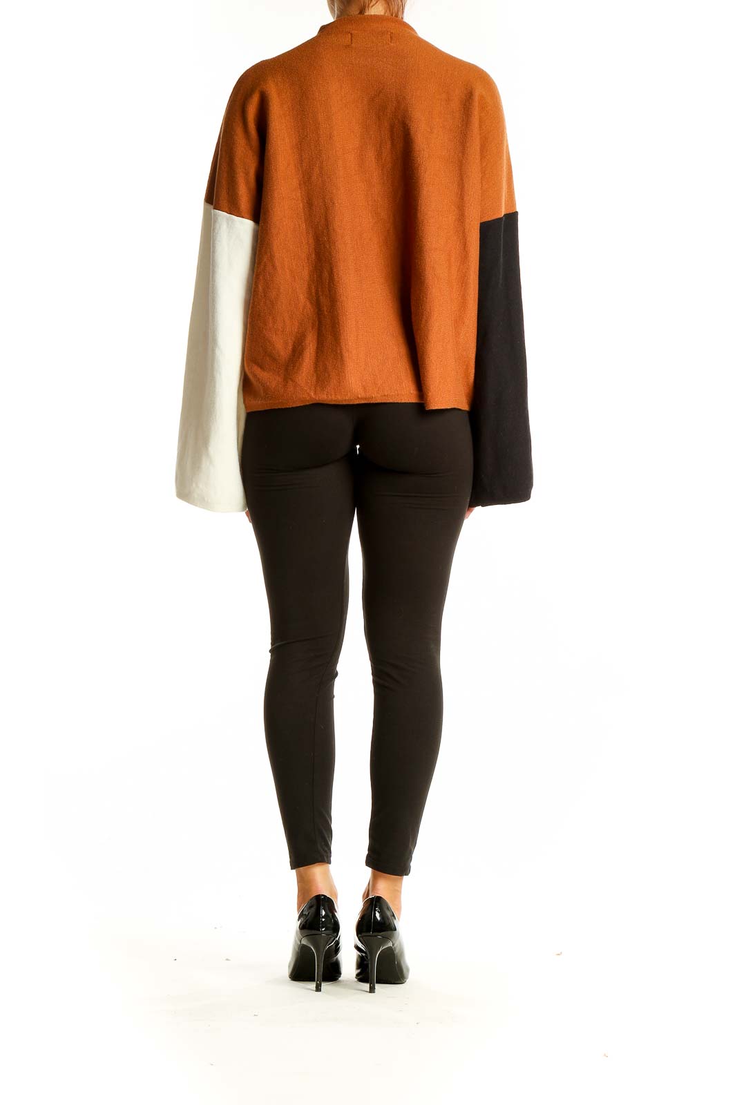 Back view of Modern Citizen color block knit sweater showing orange body and contrasting sleeves