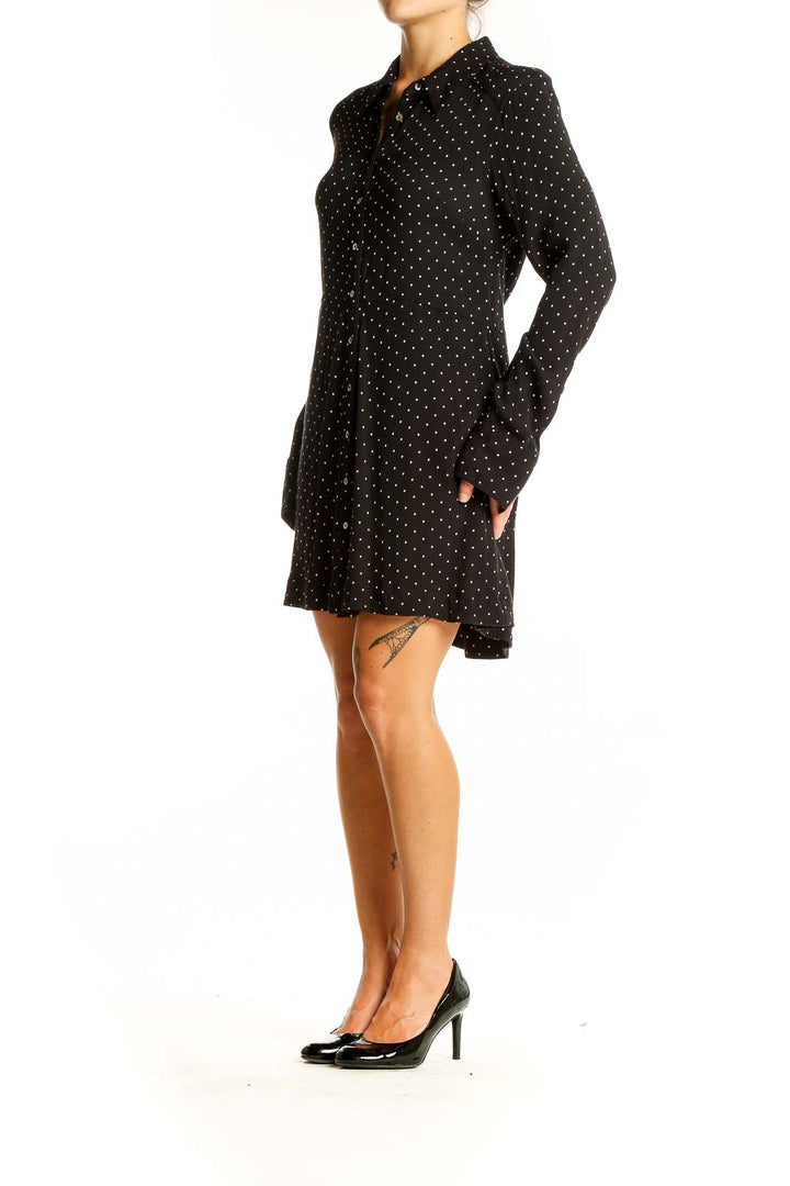 Front view of Free People black polka dot button-down shirt dress