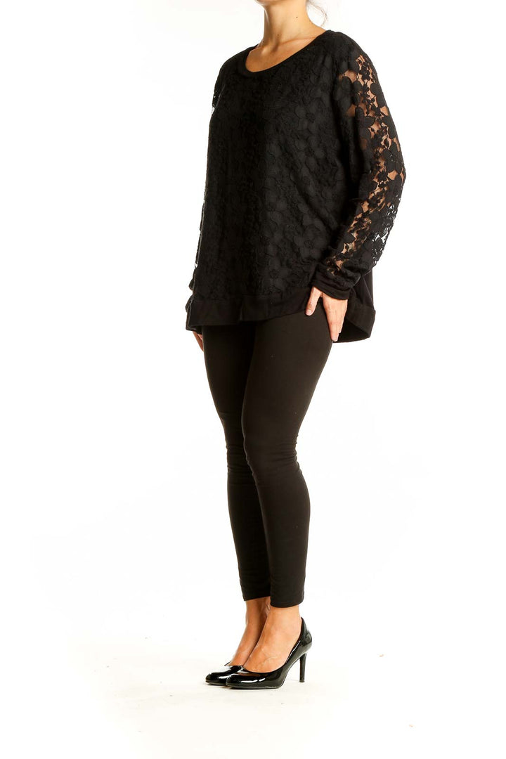 Front view of Adrianna Papell black floral lace long sleeve top