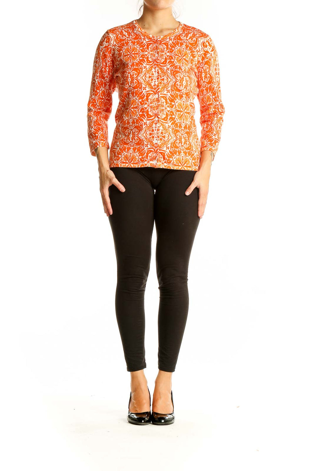 Front view of Sarah Spencer orange floral print long sleeve knit top