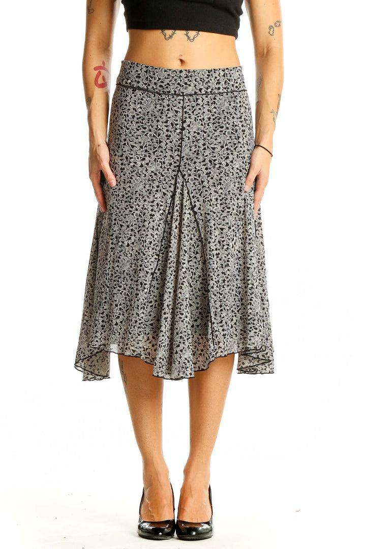 Front view of Max Studio black and white floral print midi skirt on model