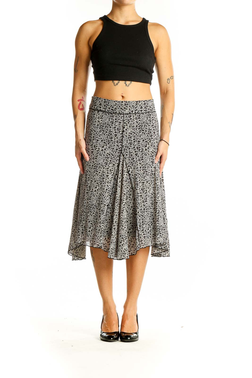 Front view of Max Studio black and white floral print midi skirt on model