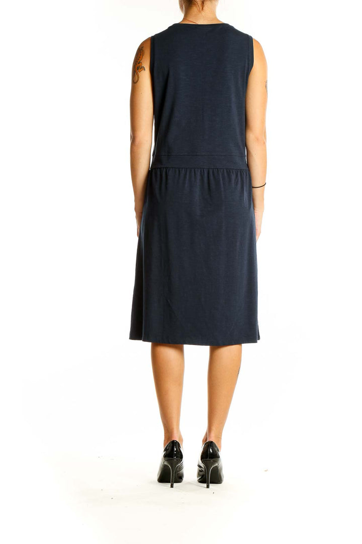 Back view of L.L.Bean navy sleeveless midi dress showing smooth fabric