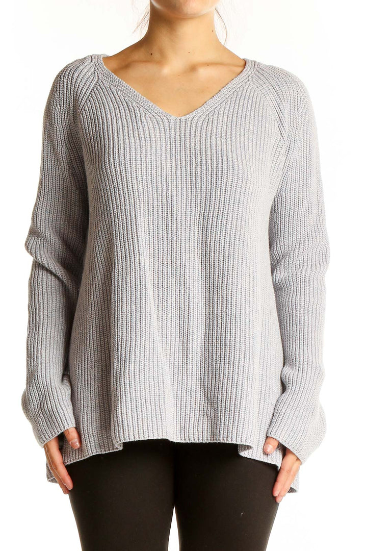 Front view of Lou & Grey gray ribbed V-neck sweater on model