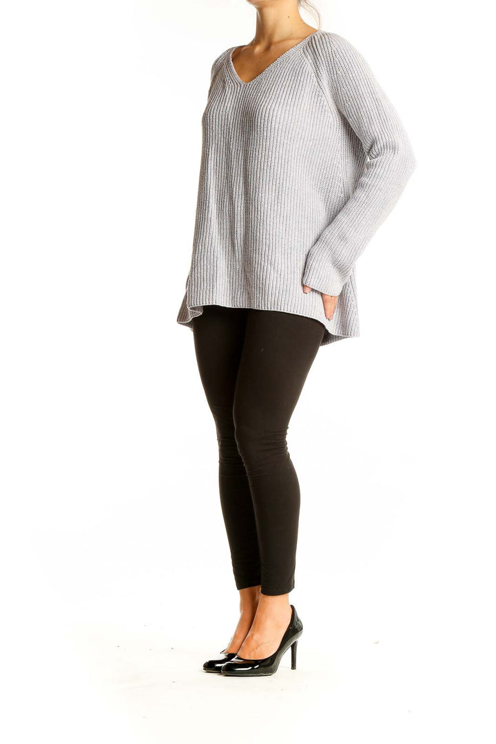 Front view of Lou & Grey gray ribbed V-neck sweater on model