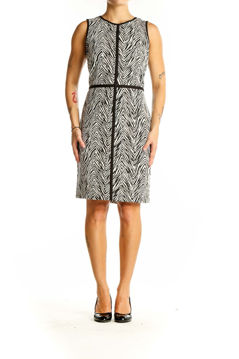 Front view of Ann Taylor black and white zebra print sheath dress with contrasting trim