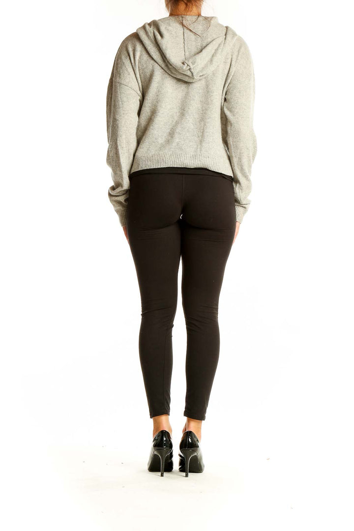 Back view of gray cropped hooded knit sweater from Reformation Jeans