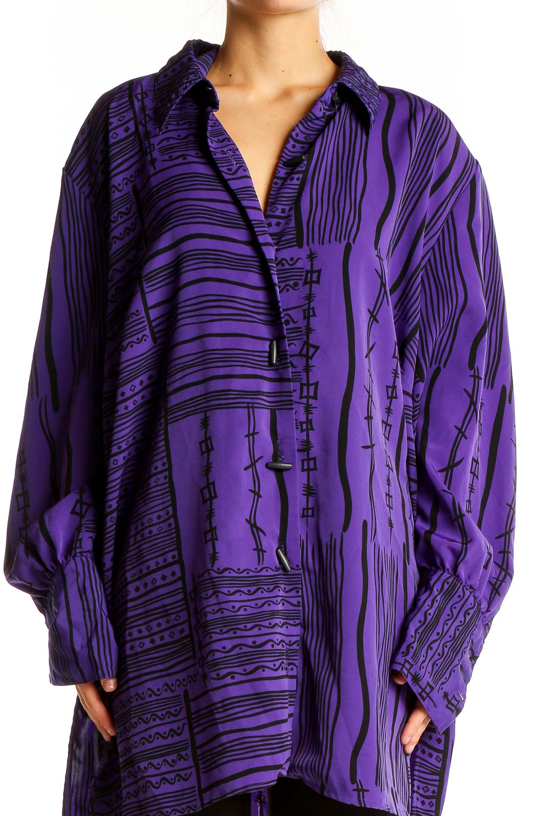 Front view of purple Jaclyn Smith tunic top with black geometric print