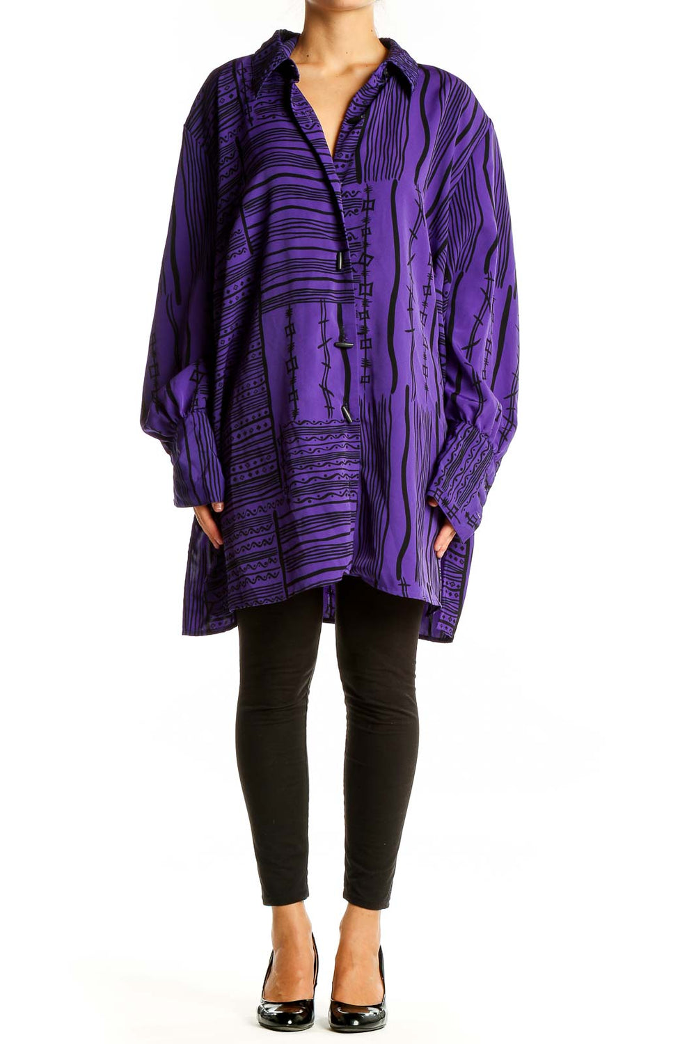 Front view of purple Jaclyn Smith tunic top with black geometric print