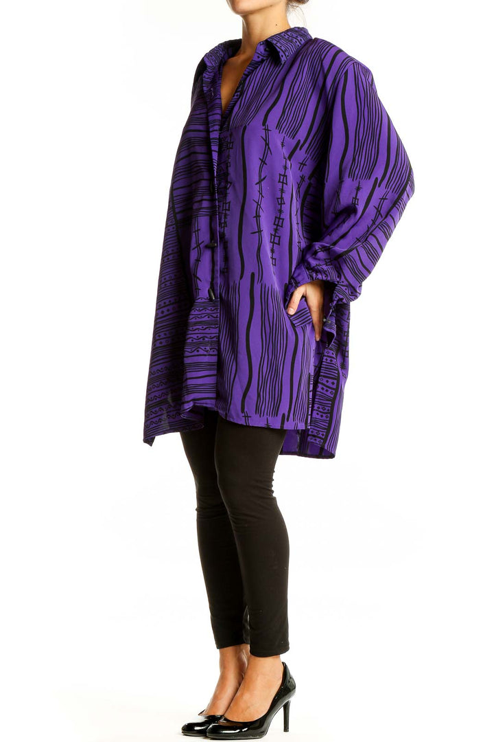 Front view of purple Jaclyn Smith tunic top with black geometric print