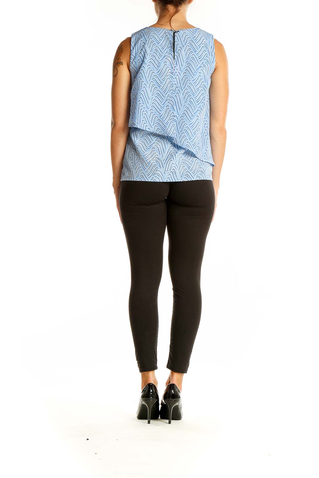 Back view of Juicy Couture light blue sleeveless top showing layered design and zipper closure